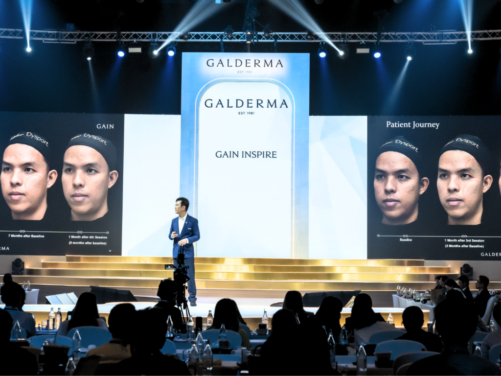 คุณหมอพุฒิพงศ์ ขึ้นบรรยายเรื่องฟิลเลอร์ เวทีใหญ่ งาน Academic Day